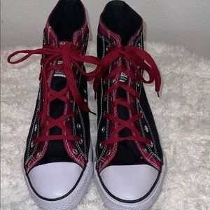 Classic Black High-Top Sneakers with Red Trim and Laces